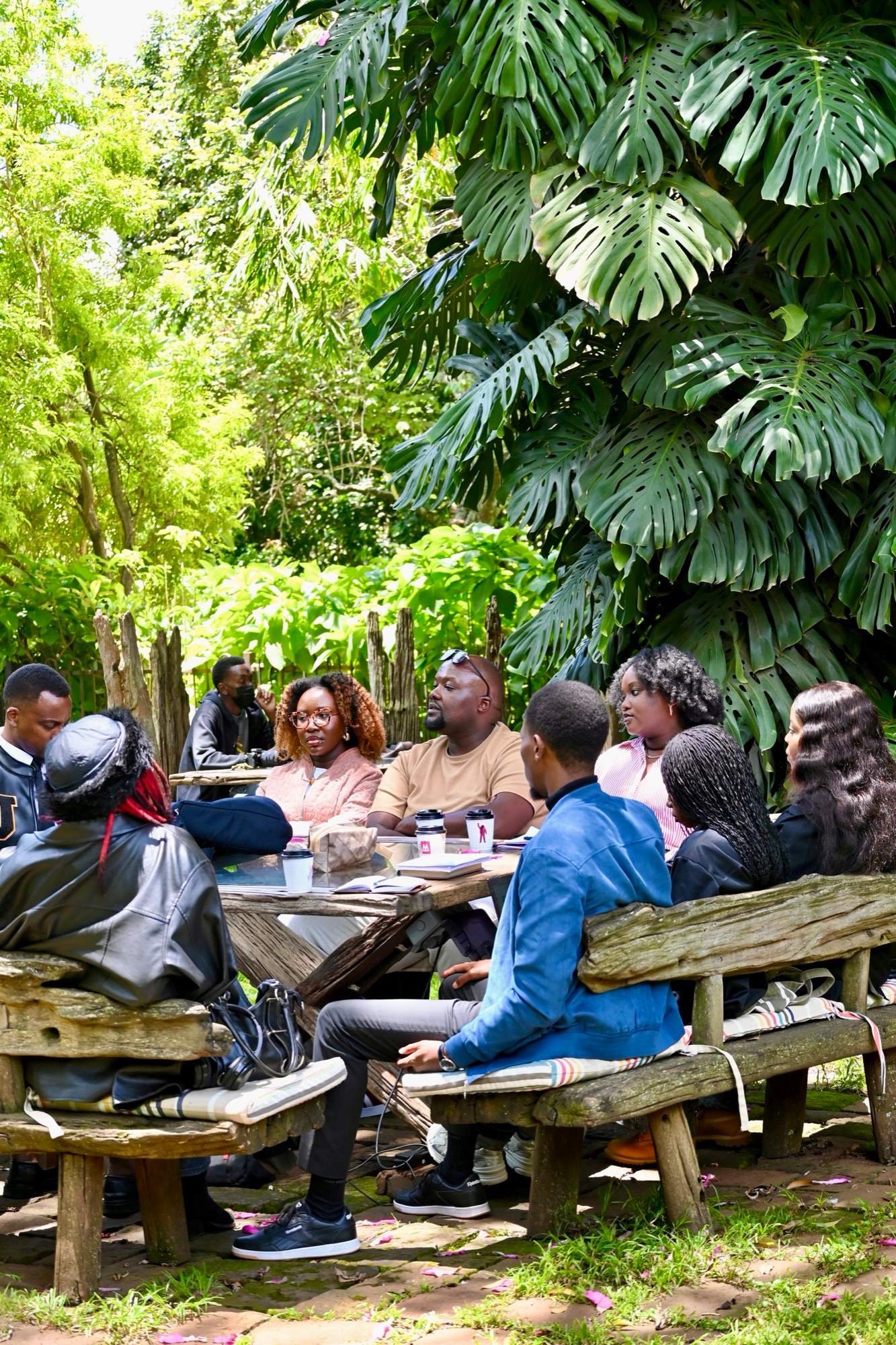 The MOOKH team around a table